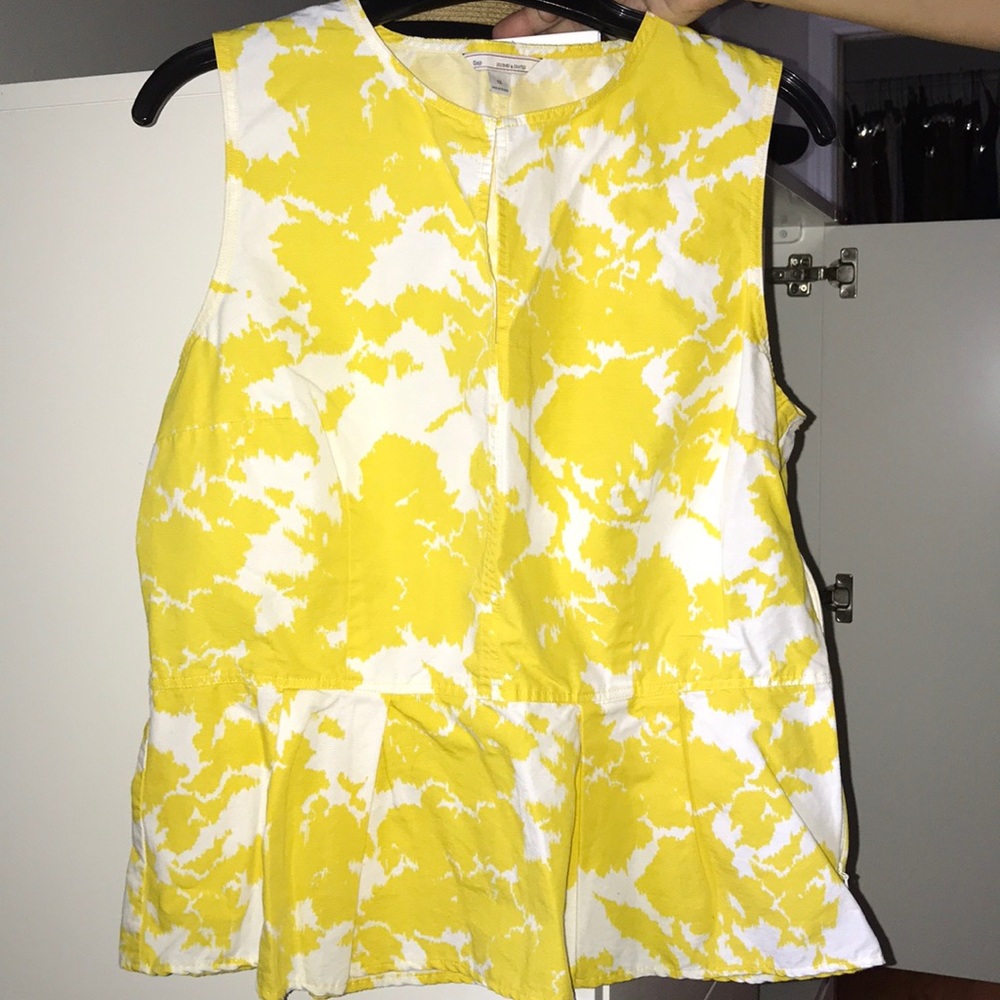 Gap Sleeveless cotton peplum tank top.